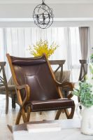 140平美式装修,复古沙发搭配红砖堆砌的电视背景墙很吸睛