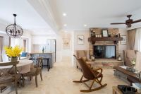 140平美式装修,复古沙发搭配红砖堆砌的电视背景墙很吸睛