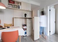 70平现代风二居室，深色的背景墙沉稳大气