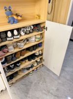 她家已经入住一年，全屋保持整洁干净，进屋就被入户鞋柜迷住