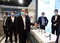 热烈欢迎居然之家领导团来公司考察洽谈合作