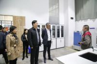 青浦区政协主席曹卫东一行莅临书香门地集团参观指导