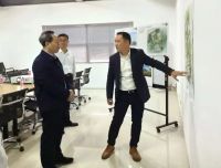 广西人大常委会副主任刘有明一行莅临书香门地集团广西公司考察调研